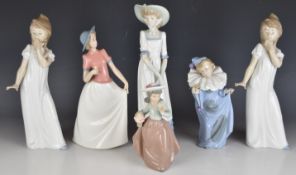 Six Nao figures of young ladies including a child clown, tallest 29cm