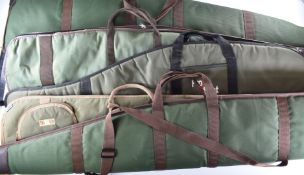 Five various padded shotgun or rifle slips including Pro Shot and GMK.