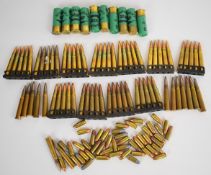 A collection of inert shotgun and rifle cartridges including Norma .303 etc.