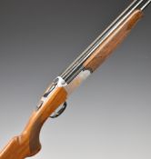 Lincoln Premier 12 bore over and under ejector shotgun with gold decoration of birds to the locks
