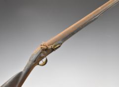 Flintlock fouling or punt gun with lock stamped with crown over 'GR' cypher, railed stock, carved
