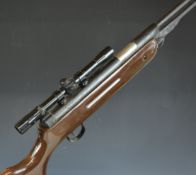 Unnamed .22 underlever air rifle with semi-pistol grip, raised cheek piece and 4x20 scope, NVSN.