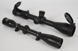 Two rifle scopes Element Helix 6-24x50 with lens covers and Artemis 2000 6x42.