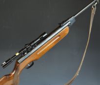 Weihrauch HW35 .22 air rifle with chequered semi-pistol grip, raised cheek piece, leather sling,