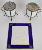 A pair of lithophane lamps with pierced covers and a lithophane panel with stained glass surround,