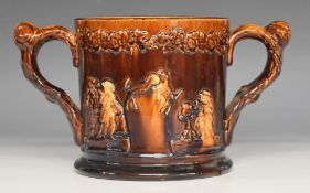 Rockingham large twin handled double frog mug with relief moulded decoration, height 17cm