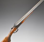 Baikal IJ-58 MAE 12 bore side by side ejector shotgun with heavy engraving of stags to the locks,