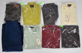 Eight items of James Purdey & Sons Ltd ladies clothing comprising six polo shirts, a navy linen
