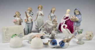 Sixteen Lladro / Nao, Coalport and Bing & Grondahl figures including birds, girls with puppies /