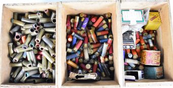 Over six hundred mainly paper and brass cased collector's shotgun cartridges in three wooden