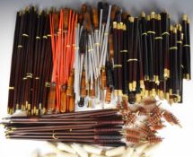 A collection of shotgun and rifle cleaning rods and accessories comprising twenty 12, 16 and 20 bore