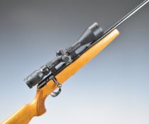 Mauser Model 107 .22 bolt-action rifle with chequered semi-pistol grip, two multi-shot magazines,