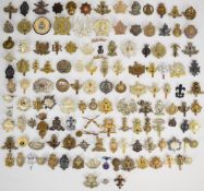 Approximately 150 cap badges, mainly British and Canadian including Royal Army Service Corps economy