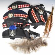 Five Scottish Regiment Glengarry hats comprising Gordon Highlanders, Cameron Highlanders, Queen's