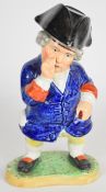 Staffordshire Toby figure taking snuff, height 37cm