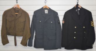 British Army khaki battle dress blouse with Monmouthshire shoulder titles and Lieutenant shoulder