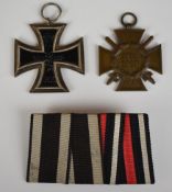 German WW1 medal pair comprising Iron Cross and Honour Cross