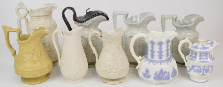 Collection of mainly Victorian relief moulded jugs and teapot including several Charles Meigh