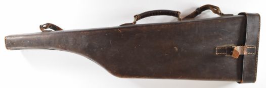 Leather leg of mutton shotgun case with fitted interior and shoulder strap, 77cm long.