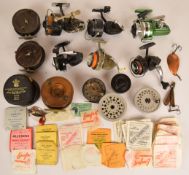 Collection of fishing reels and accessories including Mitchell 300 and 306 fixed spool reels,