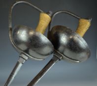 A pair of duelling epées / rapiers with bound grip, thumb rest and leather finger loop and 87cm