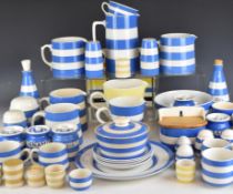 A collection of T G Green Cornishware pottery including Flour sifter, Oil and Vinegar, Milk