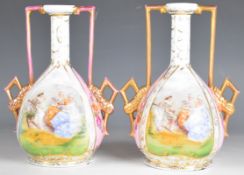 Pair of Volkstedt twin handled pedestal vases decorated with Watteau scenes, height 21cm