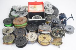Fly fishing and fixed spoil reels including Mitchell 410, boxed Mitchell fly reel, vintage wooden