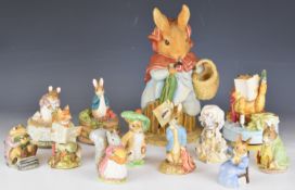 A collection of Beswick / Royal Albert and Border Fine Arts Beatrix Potter figures including large