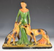 Art Deco pottery figure of a lady with two dogs, height 53cm