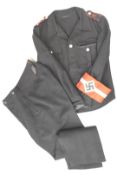 German Hitler Youth tunic and trousers together with an additional pair of trousers and a US Navy