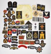 Approximately fifty British Forces cloth and bullion badges including Royal Air Force, Royal Navy,