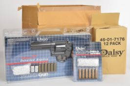 Three Daisy Model 57 airsoft pistols / revolvers together with 12 packs of associated bullets/