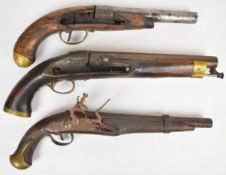 Three flintlock pistols all with brass furniture and one with captive ram-rod, largest 41cm long.