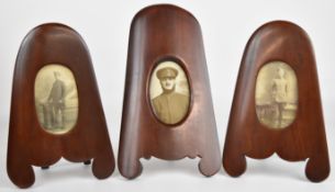 Three WW1 postcard photographs in propeller end shaped frames, two for Royal Flying Corps