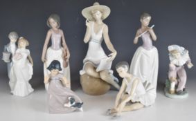Lladro / Nao seven figurines including bride and groom, girls with puppies etc, tallest 28cm