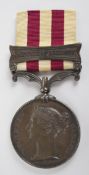 British Army Indian Mutiny Medal with clasp for Defence of Lucknow, named to Sgt W J McNeil, 32nd