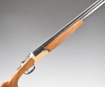 Lincoln Premier 20 bore over and under ejector shotgun with engraved scenes of birds to the locks,