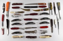 A collection of thirty five pocket / folding knives, multi blades / tools and letter openers