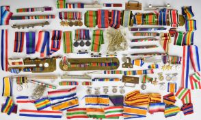 Collection of miniature medals, medal ribbons, ribbon bars and cap badge pins