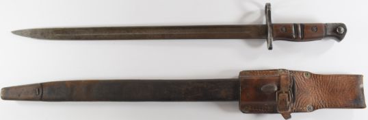 British WW1 Remington bayonet with good stamps to ricasso, a 42cm fullered blade, scabbard and