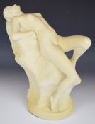 Ceramic figure of a shackled reclining nude with impressed 'NTHP, 1990' to base, height 39cm