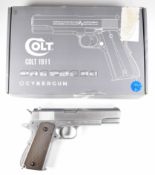 Cybergun Colt 1911 6mm CO2 airsoft pistol with chequered faux wooden grips, multi-shot magazine