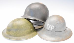 Three WW2 helmets comprising British 'Brodie' example with liner and chin strap, 'Zuckerman' Civil