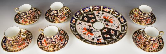 Royal Crown Derby Imari coffee ware decorated in the 2451 pattern, comprising six cups and saucers