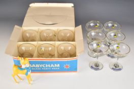 Twelve Babycham glasses including a Six Glass Party Pack in original box and an advertising or