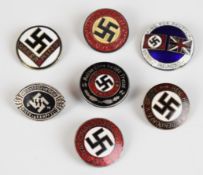 Seven WW2 German Nazi Third Reich lapel / button hole badges including Opferring, Adolf Hitler