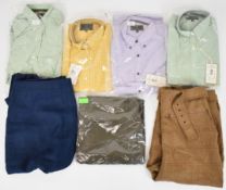 Seven items of James Purdey & Sons Ltd ladies clothing comprising four shirts (two size 12 and two