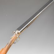 Unnamed 16 bore side by side hammer action shotgun with engraved scenes of dogs and brids to the