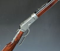 Winchester style Model 73 replica underlever-action rifle with wooden stock and forend and 21 inch